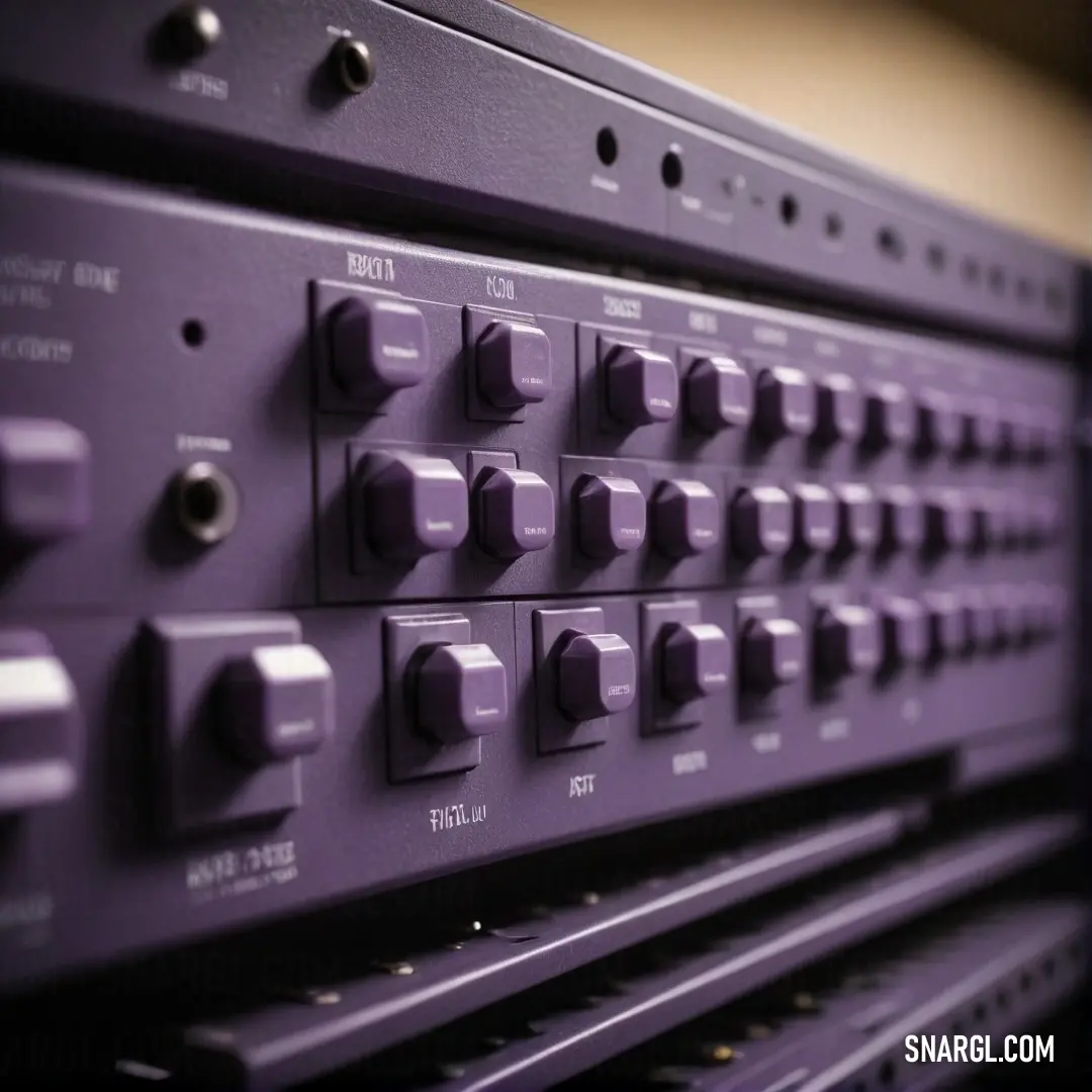 An intricate close-up of a purple sound board reveals an array of knobs and switches, bathed in rich shades against a sleek black background. This detailed perspective showcases the beauty of technology in the world of music and sound.