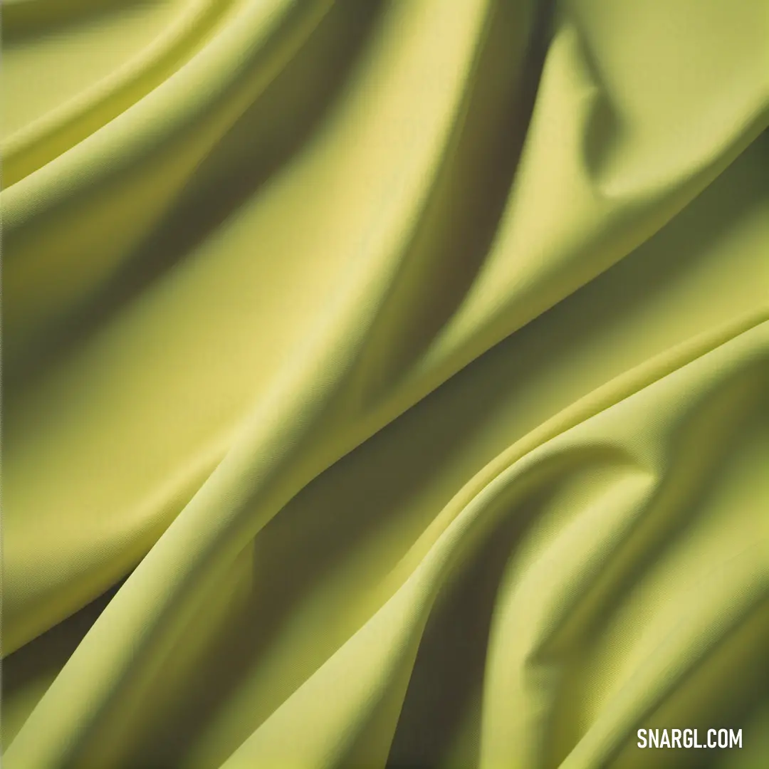 Close up of a yellow cloth with a wavy pattern on it's surface