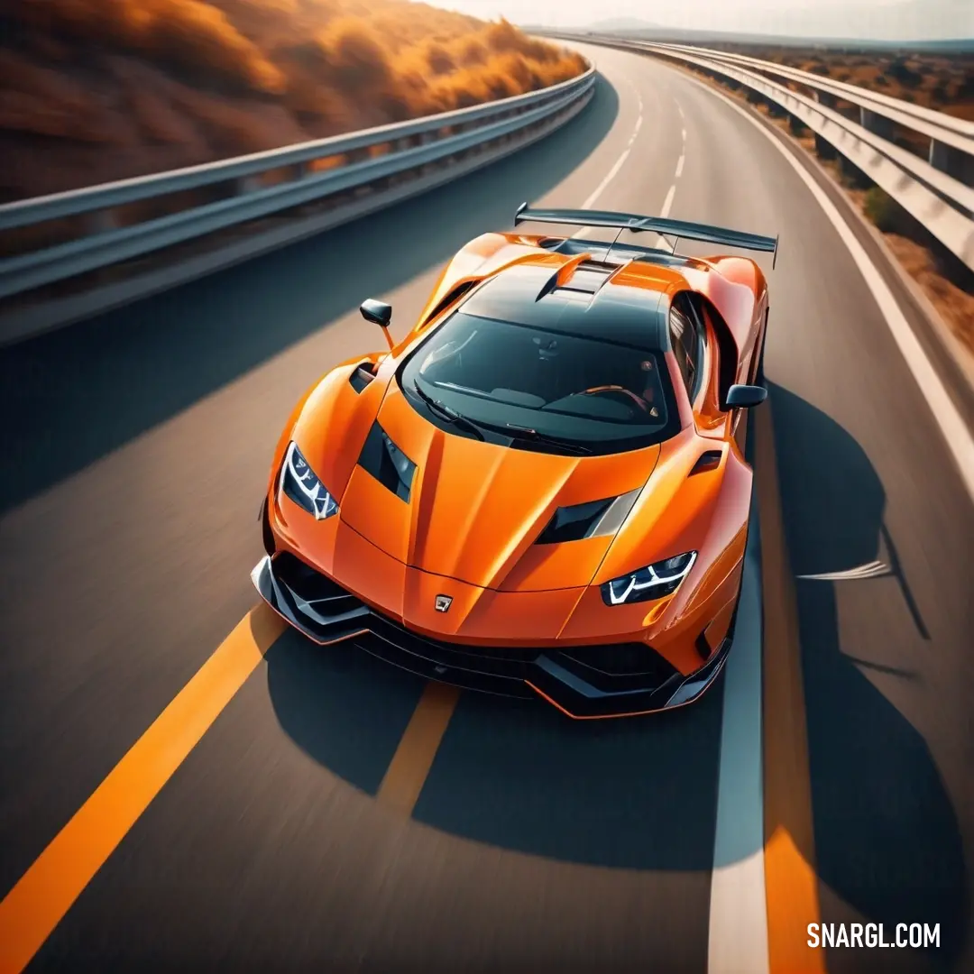 Orange sports car driving down a road with a mountain in the background. Example of CMYK 0,73,100,0 color.