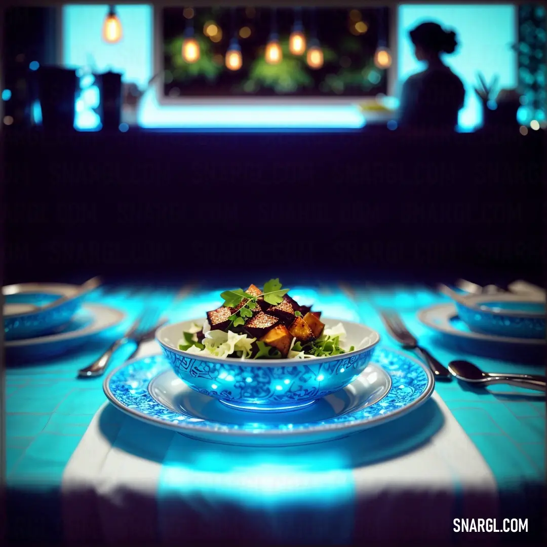 Blue and white plate with a salad on it on a table with blue lights in the background and a person in the distance