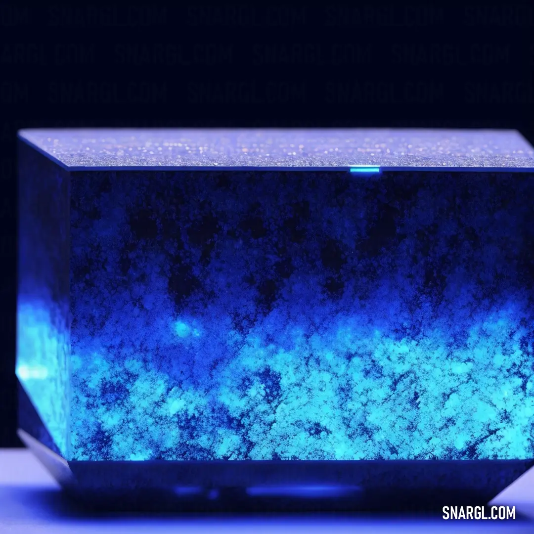 Blue box with a black background and a blue light inside it that is glowing blue