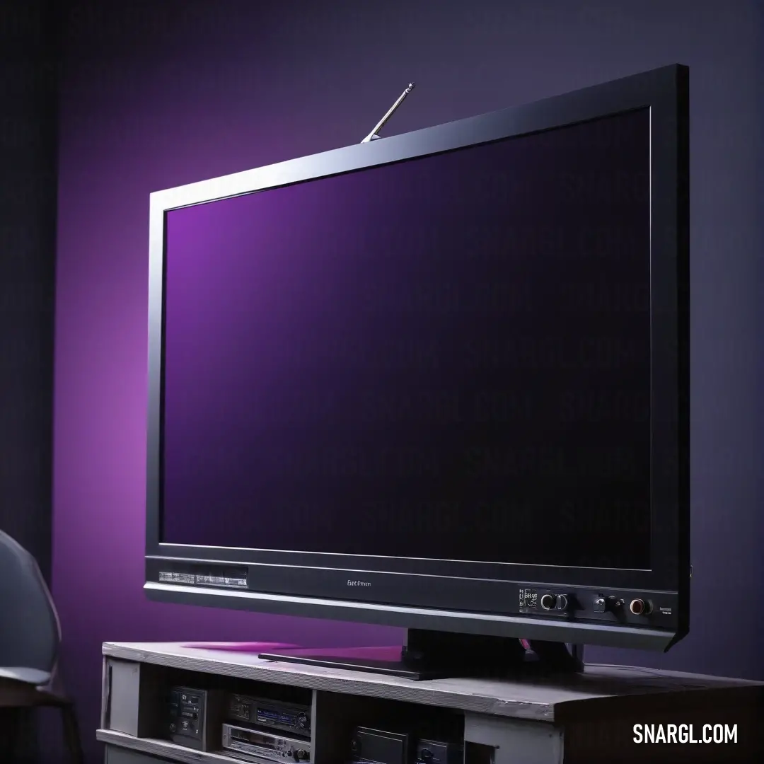 Flat screen tv on top of a wooden stand in a room with purple walls and a chair. Example of RGB 104,40,96 color.