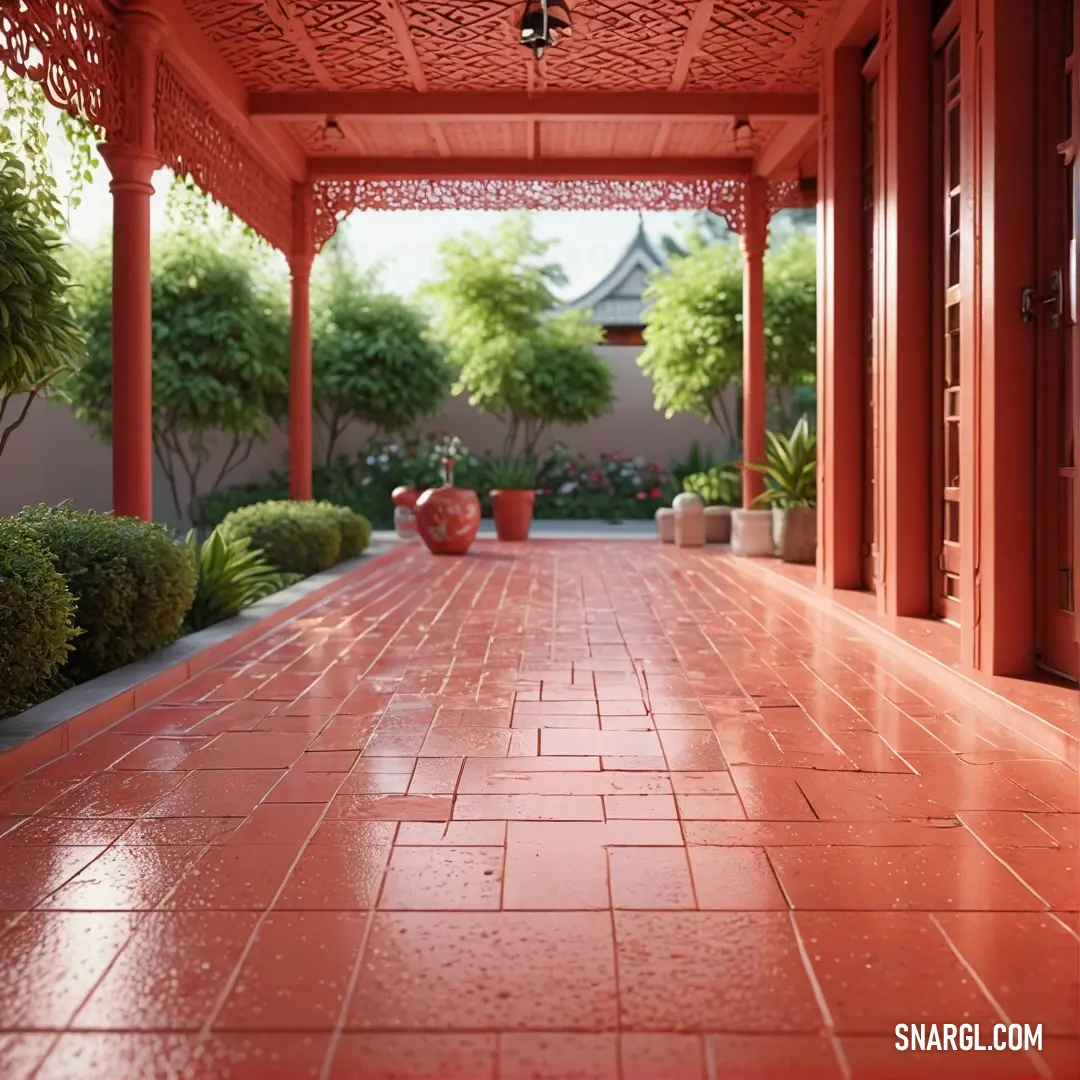 A striking red-tiled walkway adorned with artistic potted plants, set against a backdrop of vibrant trees, creating an inviting outdoor atmosphere filled with color and life.