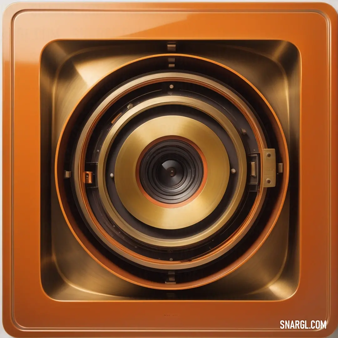 Pale gold color. Close up of a speaker with a gold background