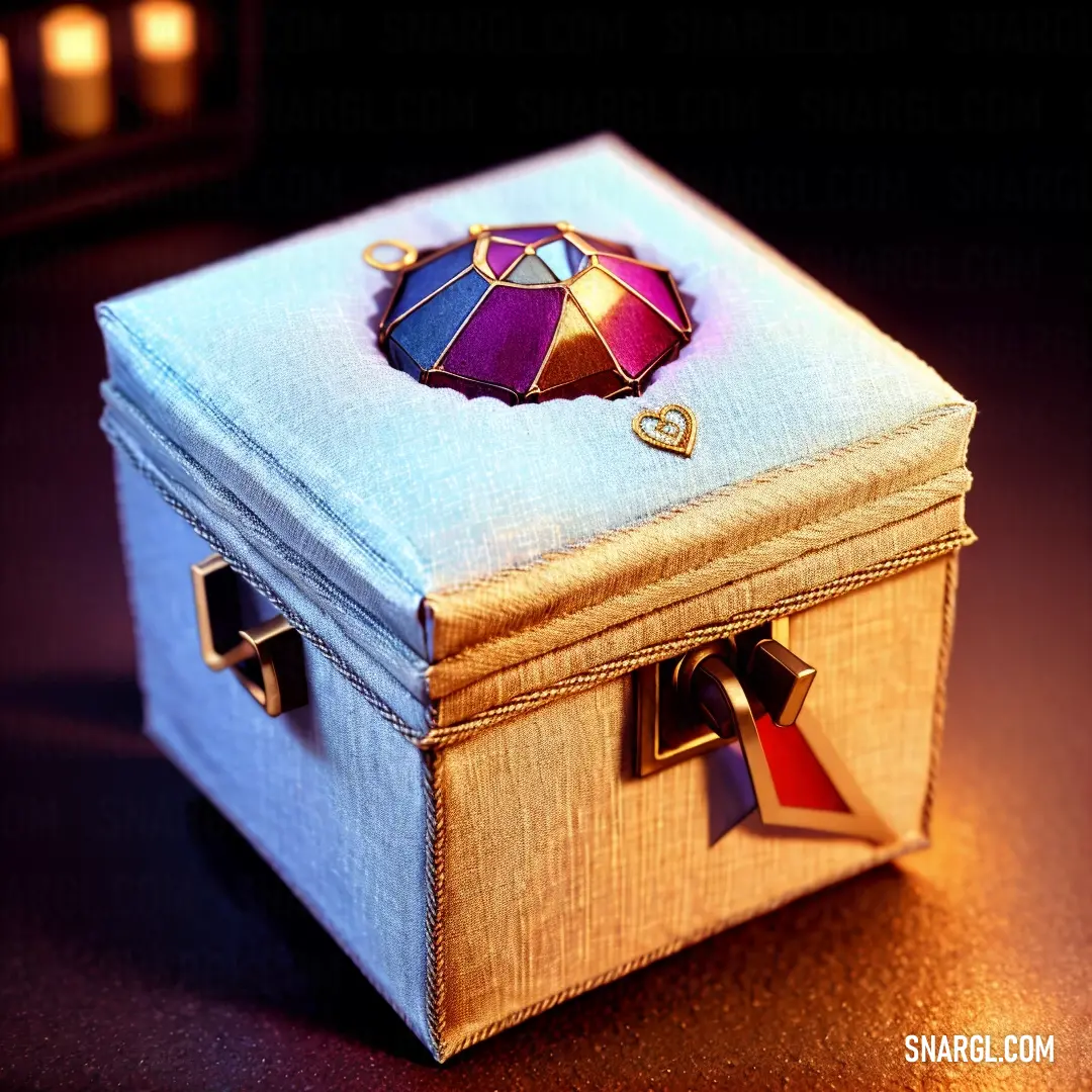 Small box with a colorful stained glass decoration on it's lid