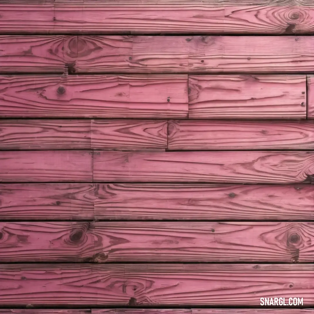Close up of a wooden wall with pink paint on it's side and a red brick wall. Color CMYK 0,49,33,14.