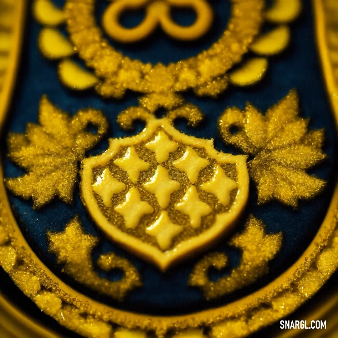 Decorative blue and yellow plate with a gold design on it's side