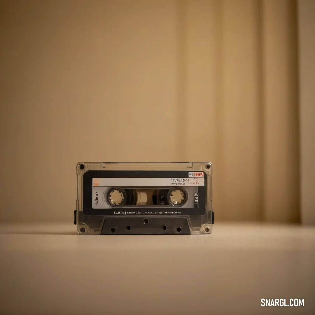 A vintage cassette player rests on a table, softly illuminated by a warm light from the side. The textured wall behind it adds depth, creating a perfect nostalgic ambiance for music lovers.