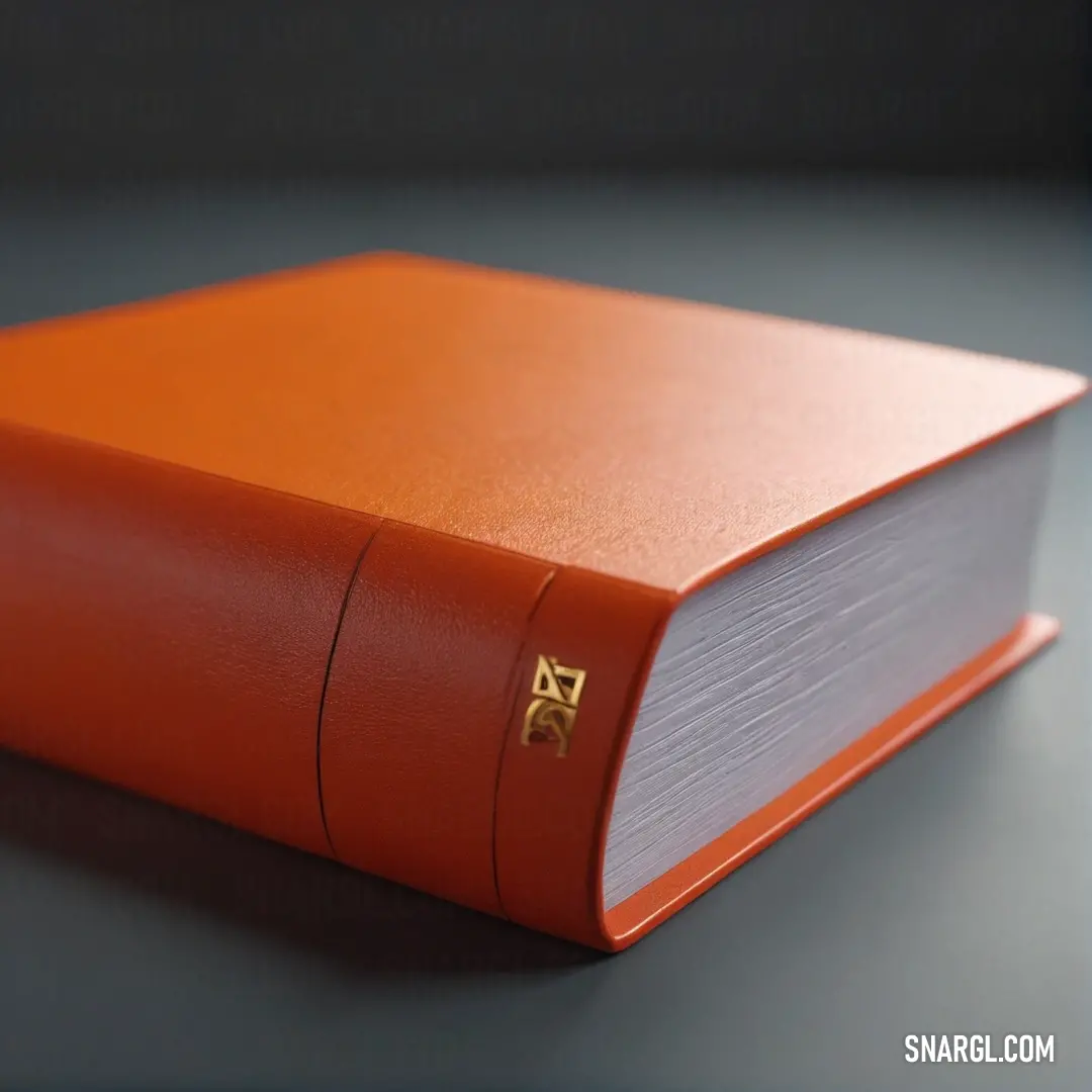 A vividly detailed red book rests atop a sleek tabletop, complemented by an elegant gold logo. Its rich color and refined presentation create an aura of sophistication against a deep black background.