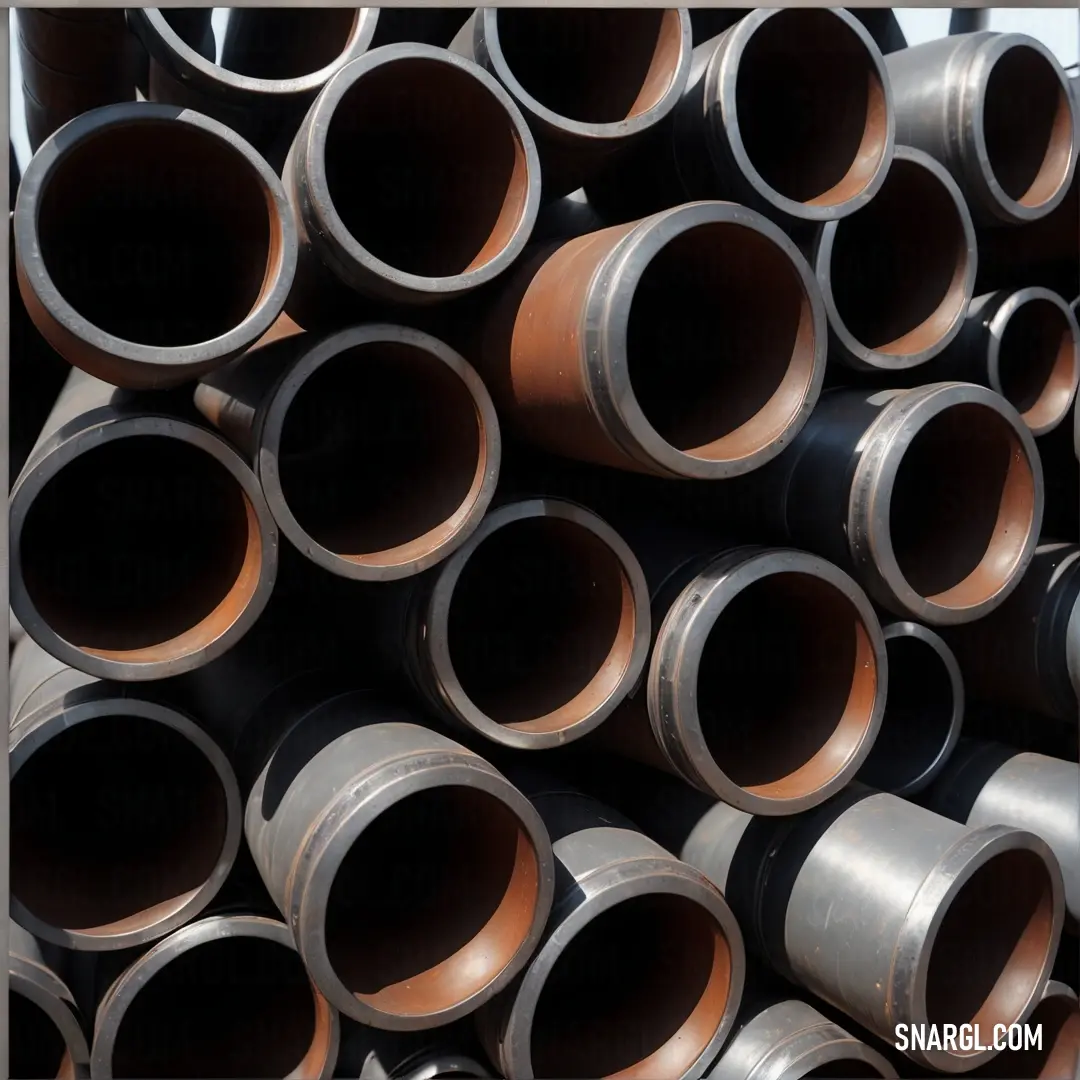 A compressed pile of pipes, artistically arranged within a defined square frame. The color #B27827 warmly envelops the gathering, adding depth and creating an intriguing focal point for industrial aesthetics.