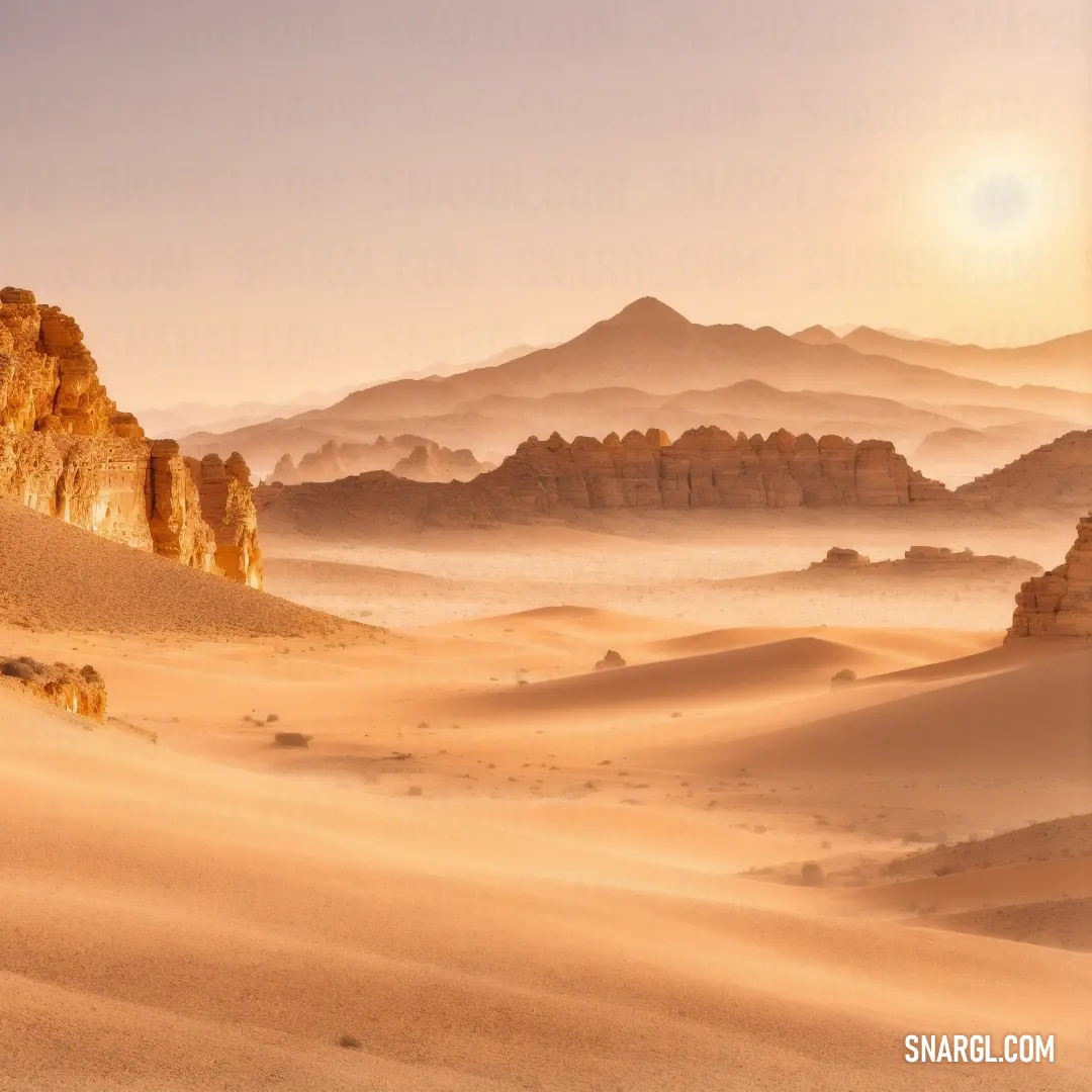Desert with a mountain range in the background and a sun setting in the distance over the mountains and sand dunes