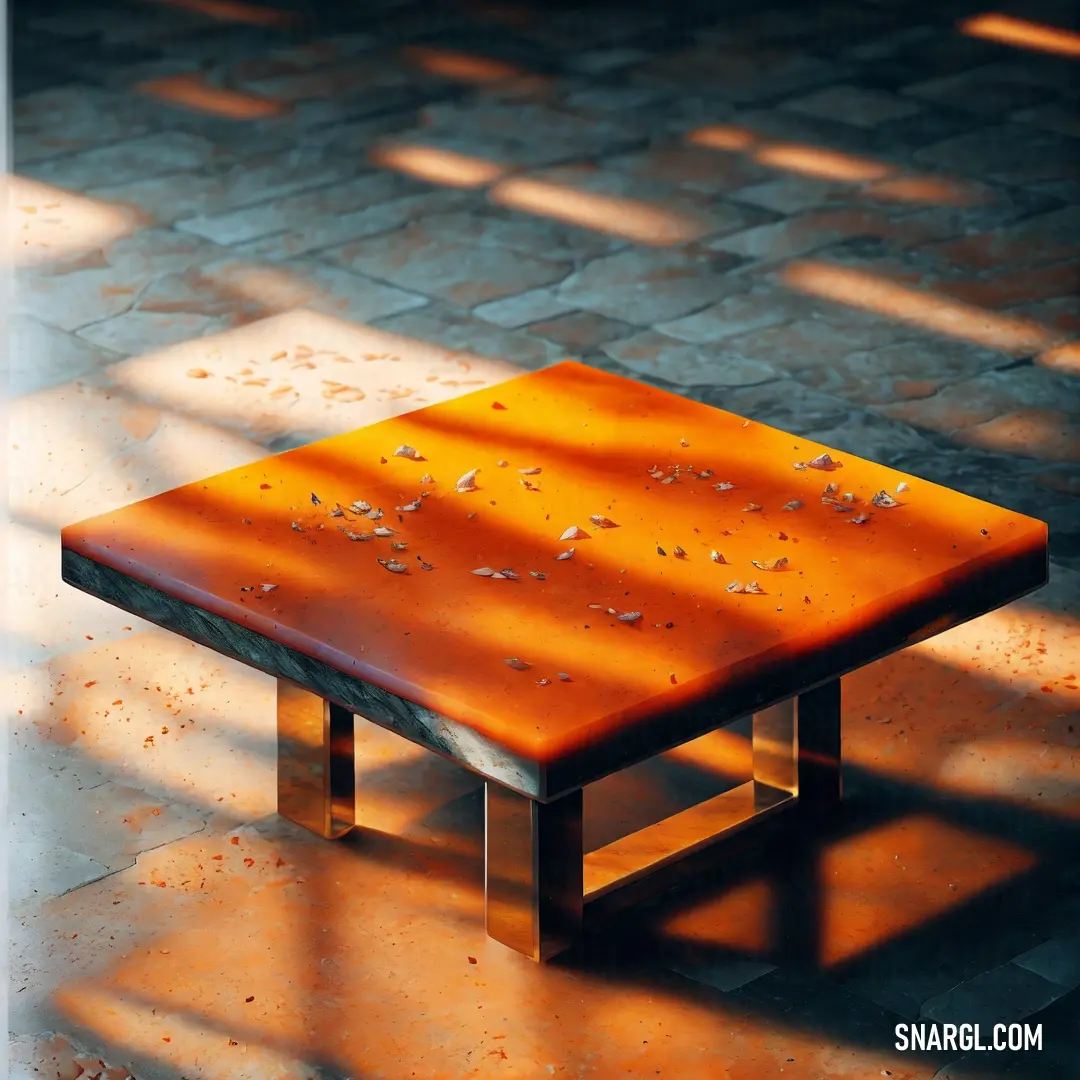 Wooden table with a metal base on a tiled floor with a shadow of a tree on the ground