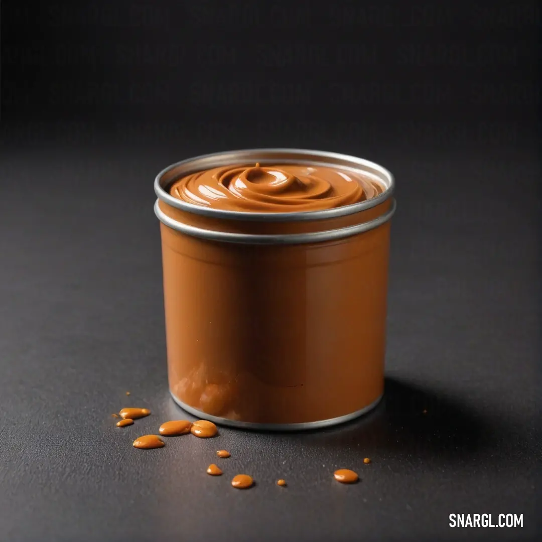 A tantalizing can of peanut butter, topped with a spoon, is surrounded by scattered peanuts on a sleek table. The captivating RGB color of 230,138,72 creates a mouthwatering scene that evokes a sense of comfort and homeliness in the kitchen.