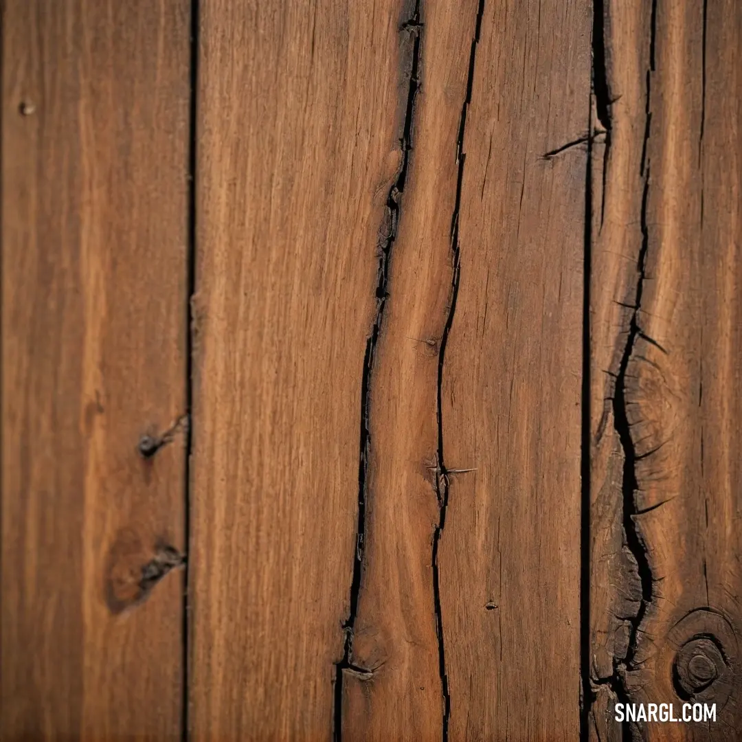 An inviting close-up of a rustic wooden surface showcases a sleek cell phone resting elegantly on its side. The soft, natural textures of the wood contrast beautifully with the modern design of the phone, creating a blend of tradition and contemporary sty