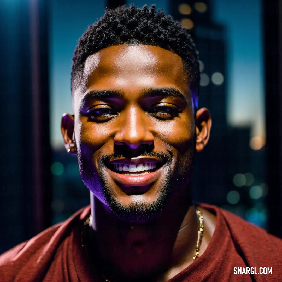 Man with a purple face paint smiling at the camera with a city in the background at night time