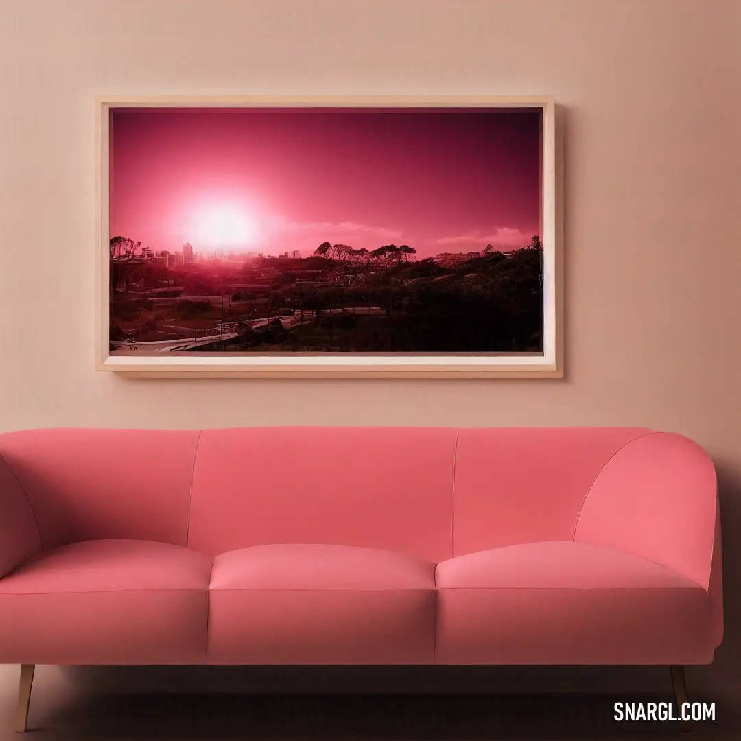 Pink couch in a room with a pink wall and a pink painting on the wall above it that has a pink couch