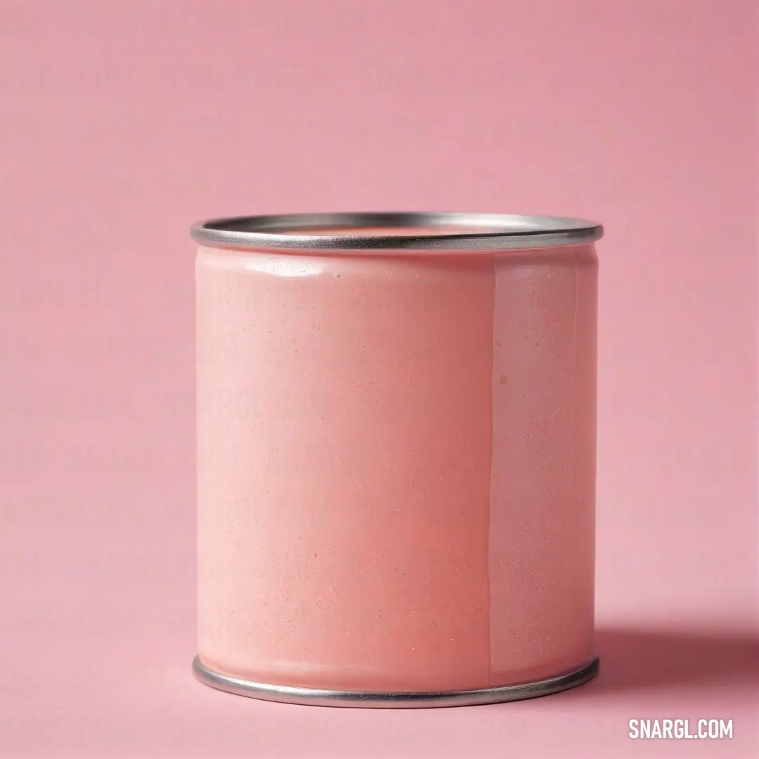 A striking pink can with a silver rim stands out against a vibrant pink backdrop, showcasing its sleek design while conveying a sense of fun and freshness, symbolizing contemporary style in everyday items.