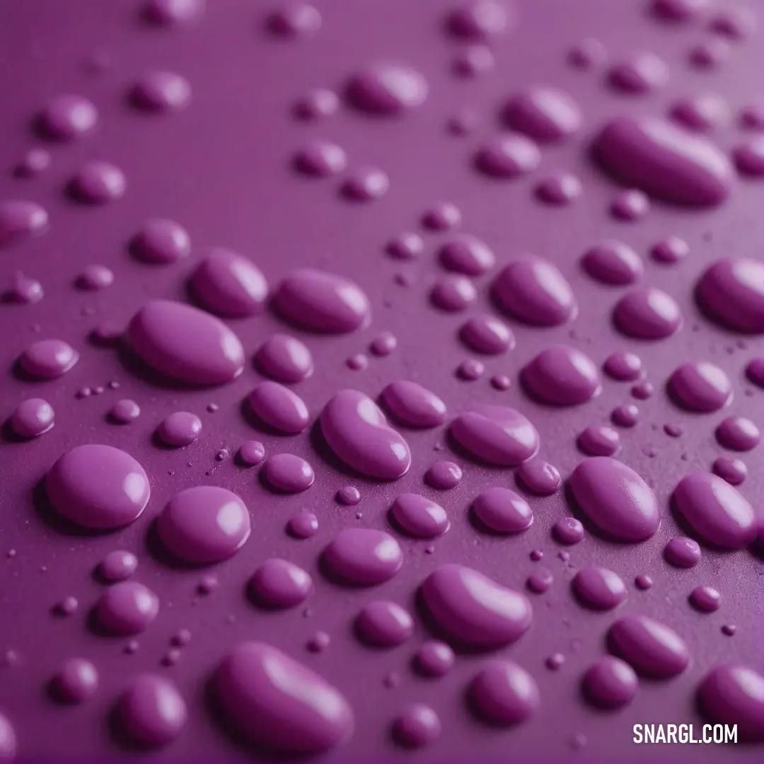 An alluring close-up of a rich purple surface glistening with delicate water droplets, showcasing an interplay of textures and light that evokes a sense of freshness and serenity in the viewer's imagination.