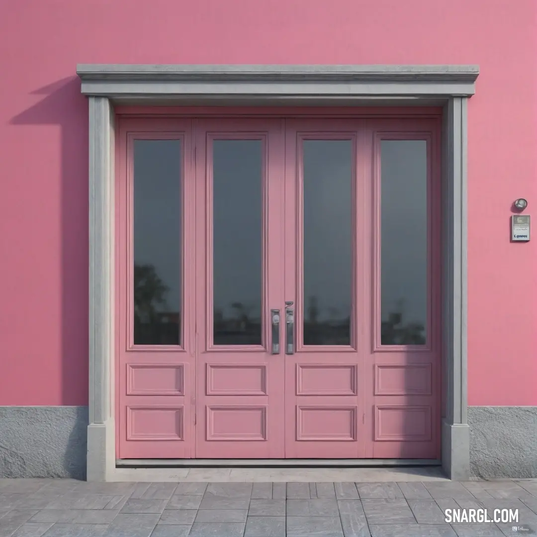 A charming pink door, adorned with a glass window, stands out on a softly pink wall, framed by a light gray trim. The harmonious colors and soft design invite exploration, creating a warm and cozy atmosphere.