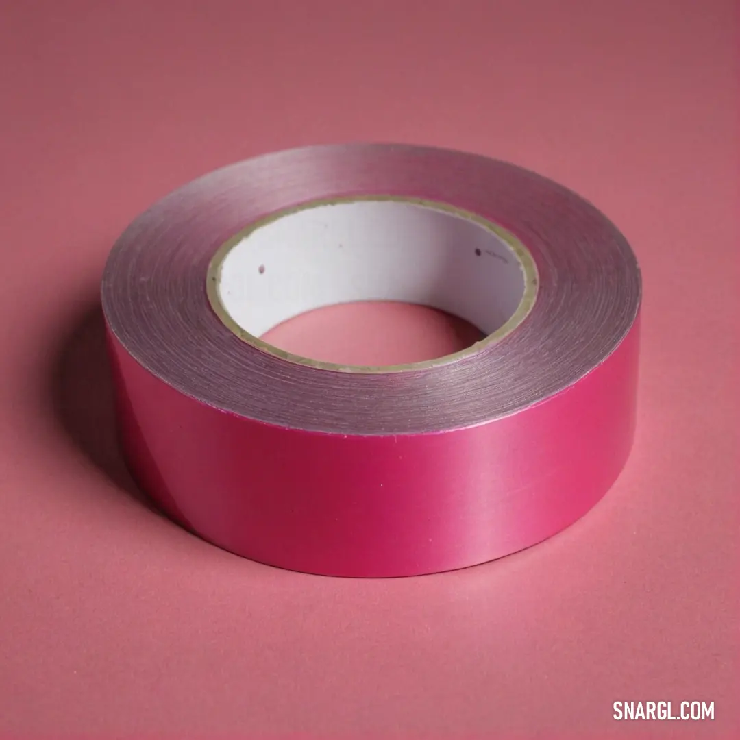 A roll of striking pink tape rests on a textured pink surface, showcasing its bright hue and smooth surface, representing a perfect fusion of simplicity and style. Example of PANTONE 206 color.