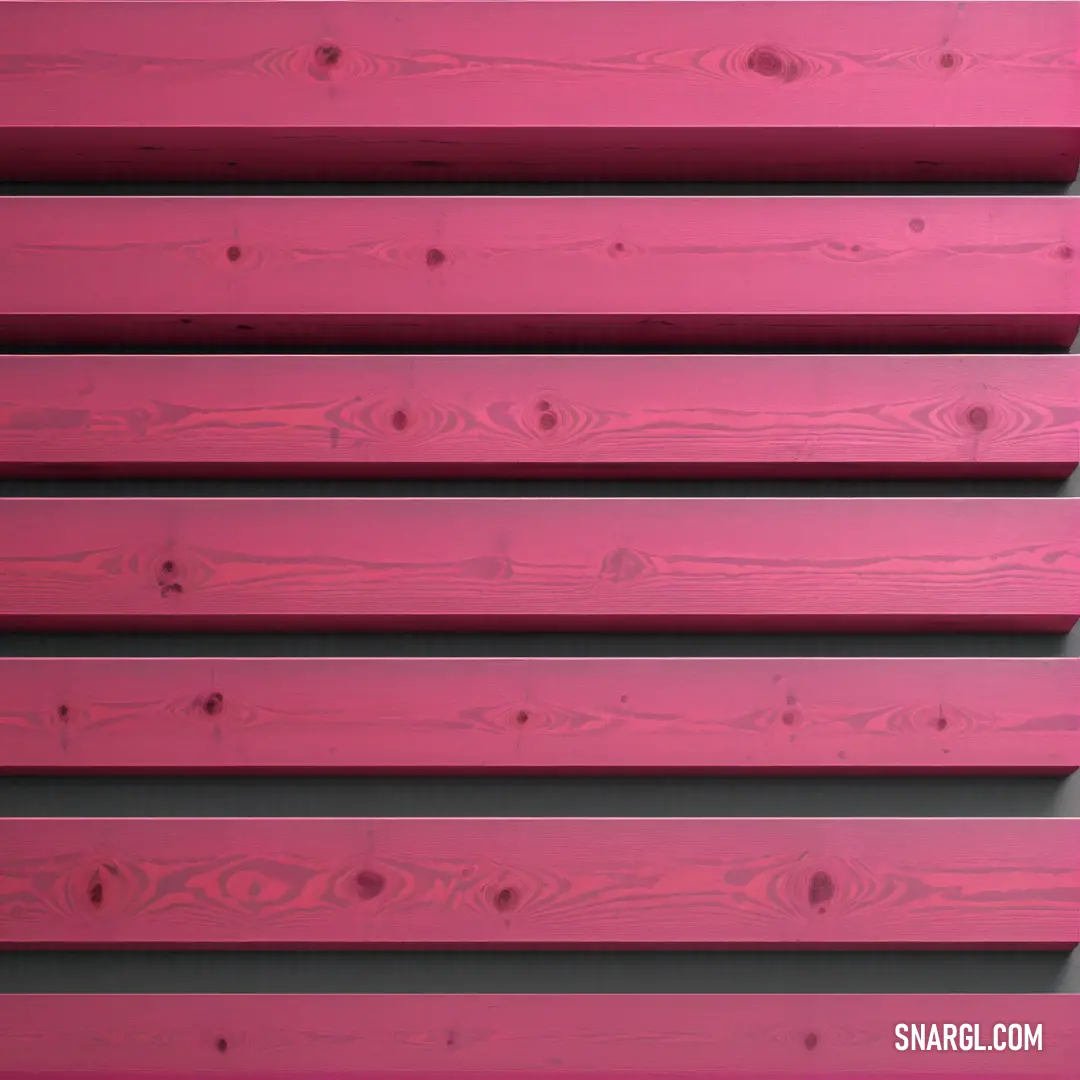 A stylish pink wall embodies a modern aesthetic, detailed with a wooden slat design alongside a vibrant red wall. The interplay of colors captures the essence of #C16198, creating an invitingly warm atmosphere.