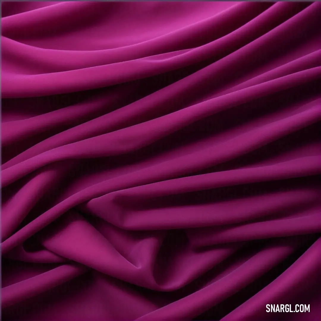 Purple fabric with a very long, thin line of folds on it's side and a black background. Color PANTONE 2063.
