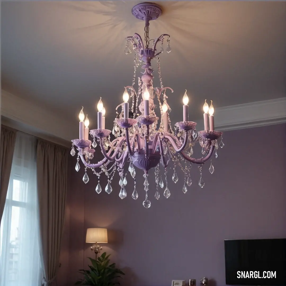 A chandelier with delicate crystals hangs from the ceiling in a room with purple walls, complemented by purple furniture. The PANTONE 2076 color creates an elegant, sophisticated atmosphere that highlights the room's opulence.