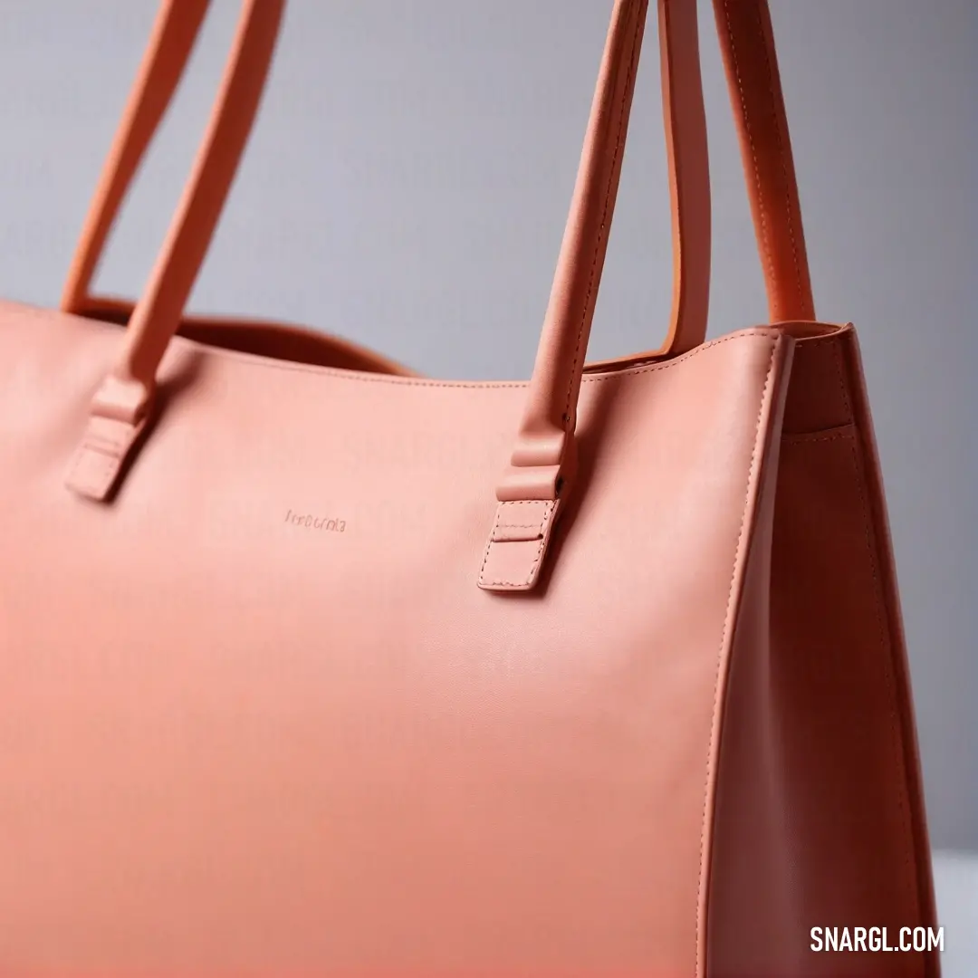 A chic pink purse rests on a clean white table, its brown handle adding a touch of elegance. The soft, warm pink tone (CMYK 0,61,6,0) contrasts beautifully with the neutral background, creating a stylish and minimalistic vibe.