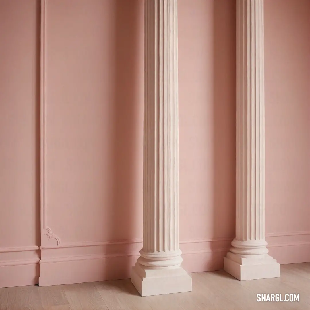 A whimsical pink room showcasing three stunning white pillars alongside a vibrant pink wall, complemented by a quirky white clock lying on its side, all coming together in a harmonious blend that captivates the senses and invigorates the space.