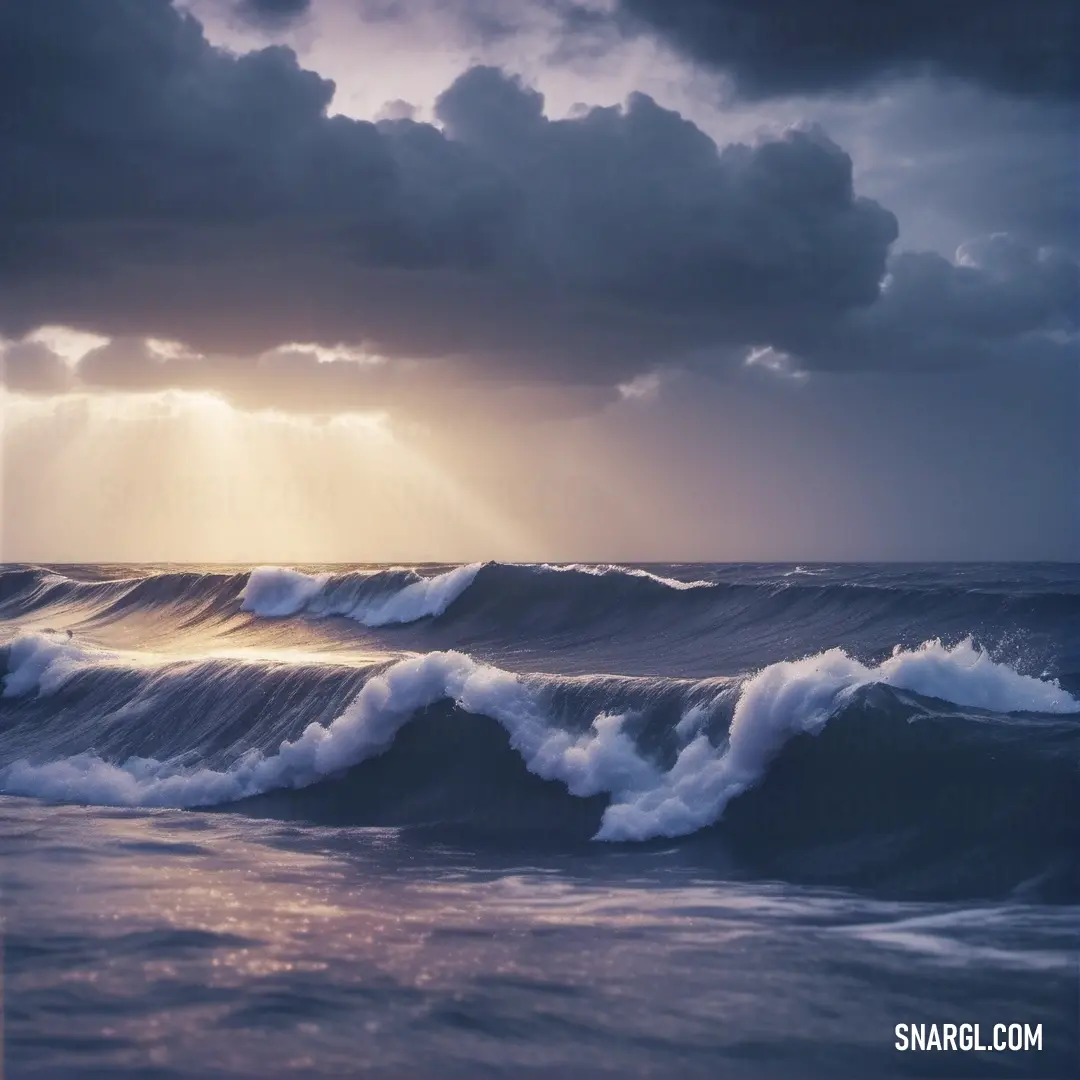 Large wave is breaking in the ocean with a sunbeam in the background. Example of PANTONE 2111 color.