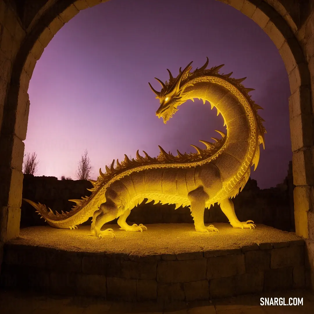 Statue of a dragon is lit up at night in a stone arch with a purple sky in the background. Example of PANTONE 2114 color.