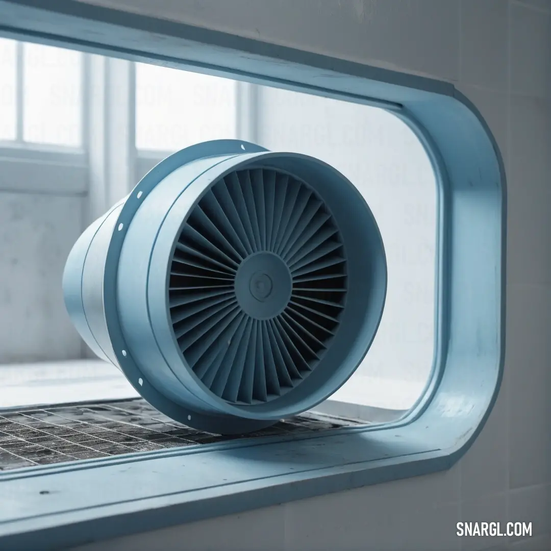 PANTONE 2167 color example: Blue fan on top of a window sill in a bathroom next to a window sill