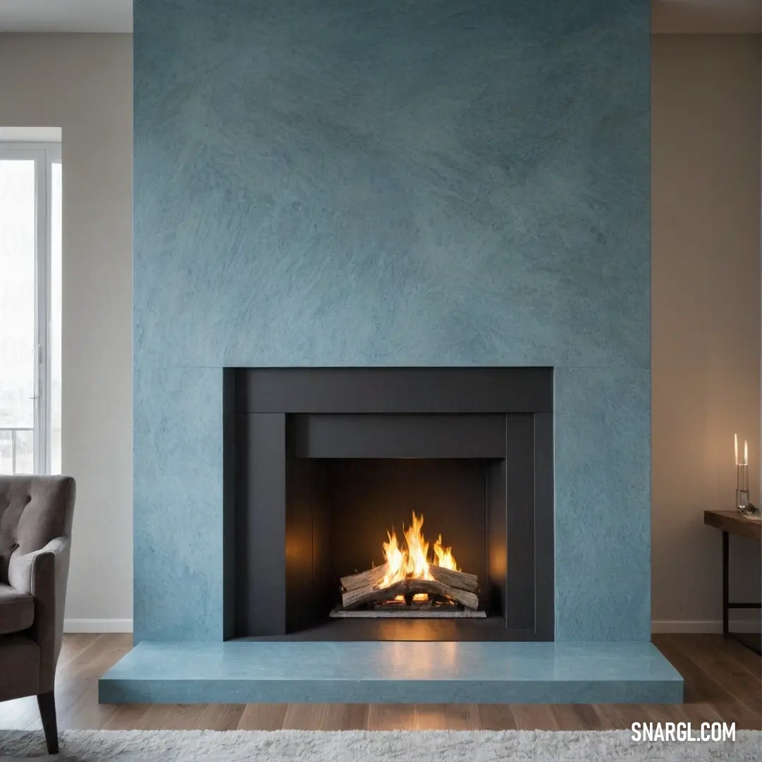 A cozy fireplace framed by a soothing blue wall, with an elegant chair positioned in front, creating a warm and inviting atmosphere exemplified by the gentle hues of color #769FAB.