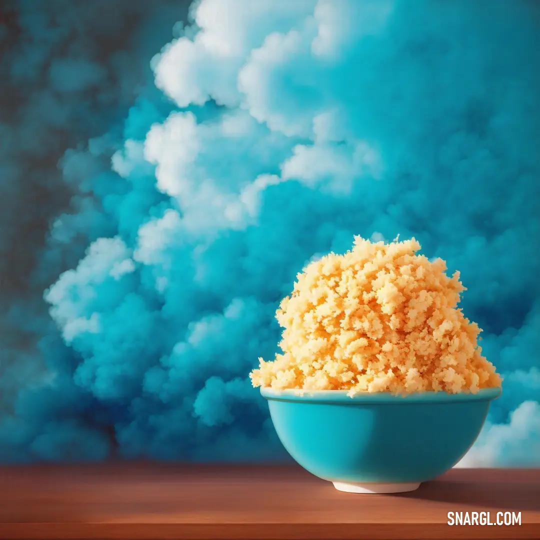 Bowl of rice is on a table with a blue sky in the background. Example of PANTONE 2183 color.