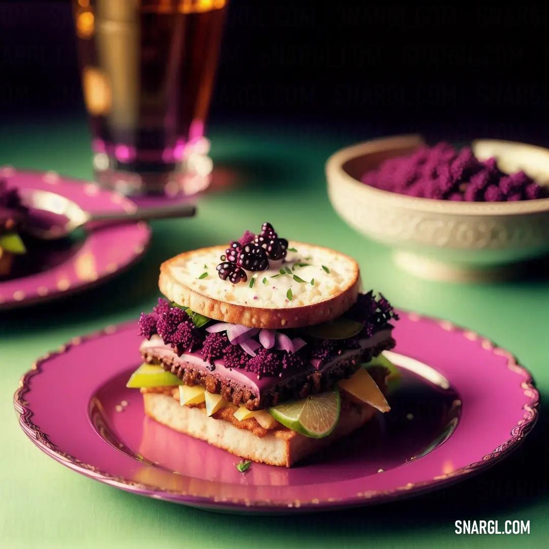 Sandwich with purple cauliflower and blackberries on a plate with a glass of beer in the background
