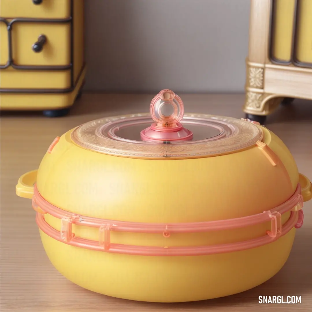 A yellow container with a pink lid rests on a table beside a dresser. The simplicity of the container contrasts with the intricate details of the dresser, bringing a touch of color and playfulness to the room's decor.