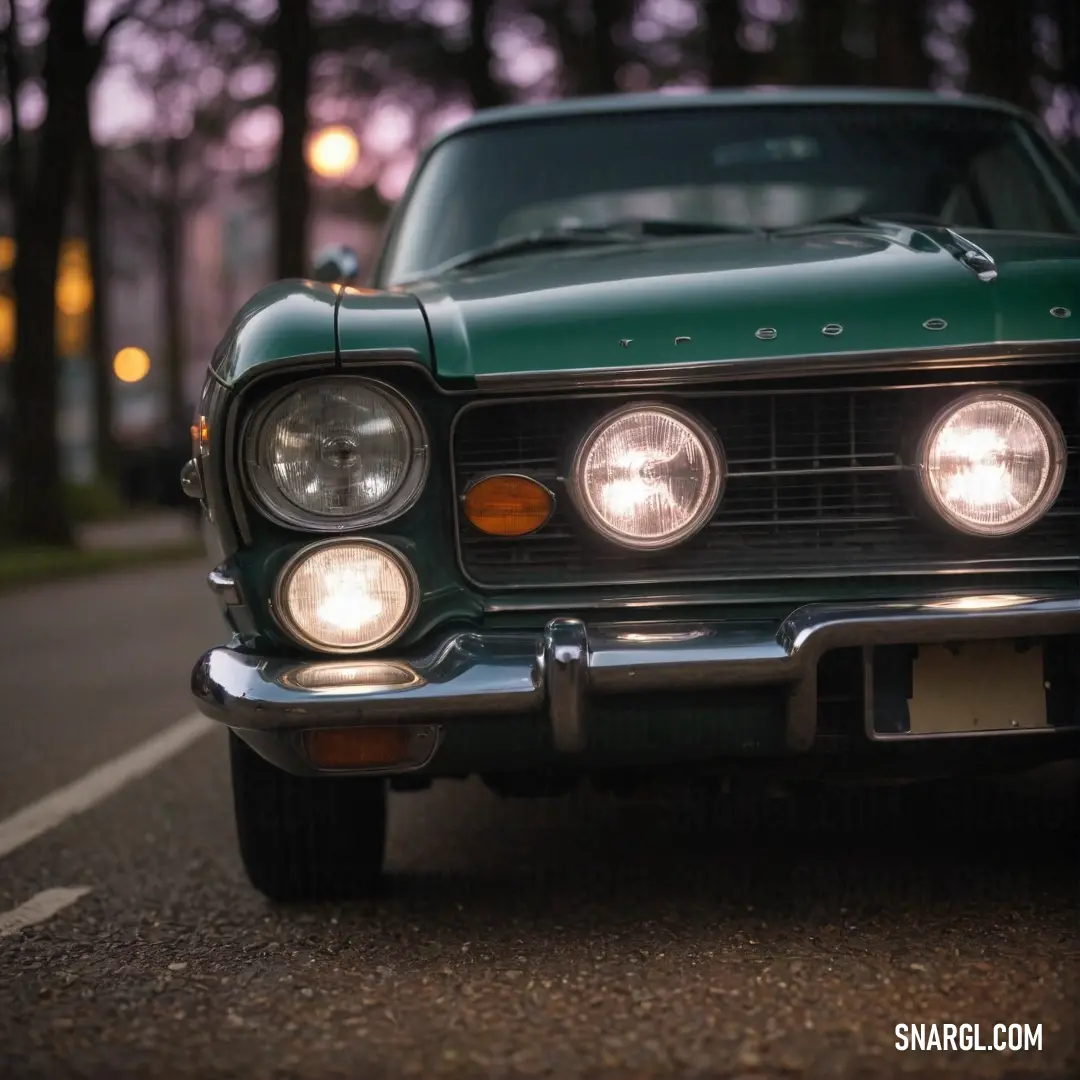 A spirited green car with its headlights aglow is parked on a street, flanked by a serene streetlight and greenery; the RGB 117, 102, and 69 colors create an inviting and warm ambiance.