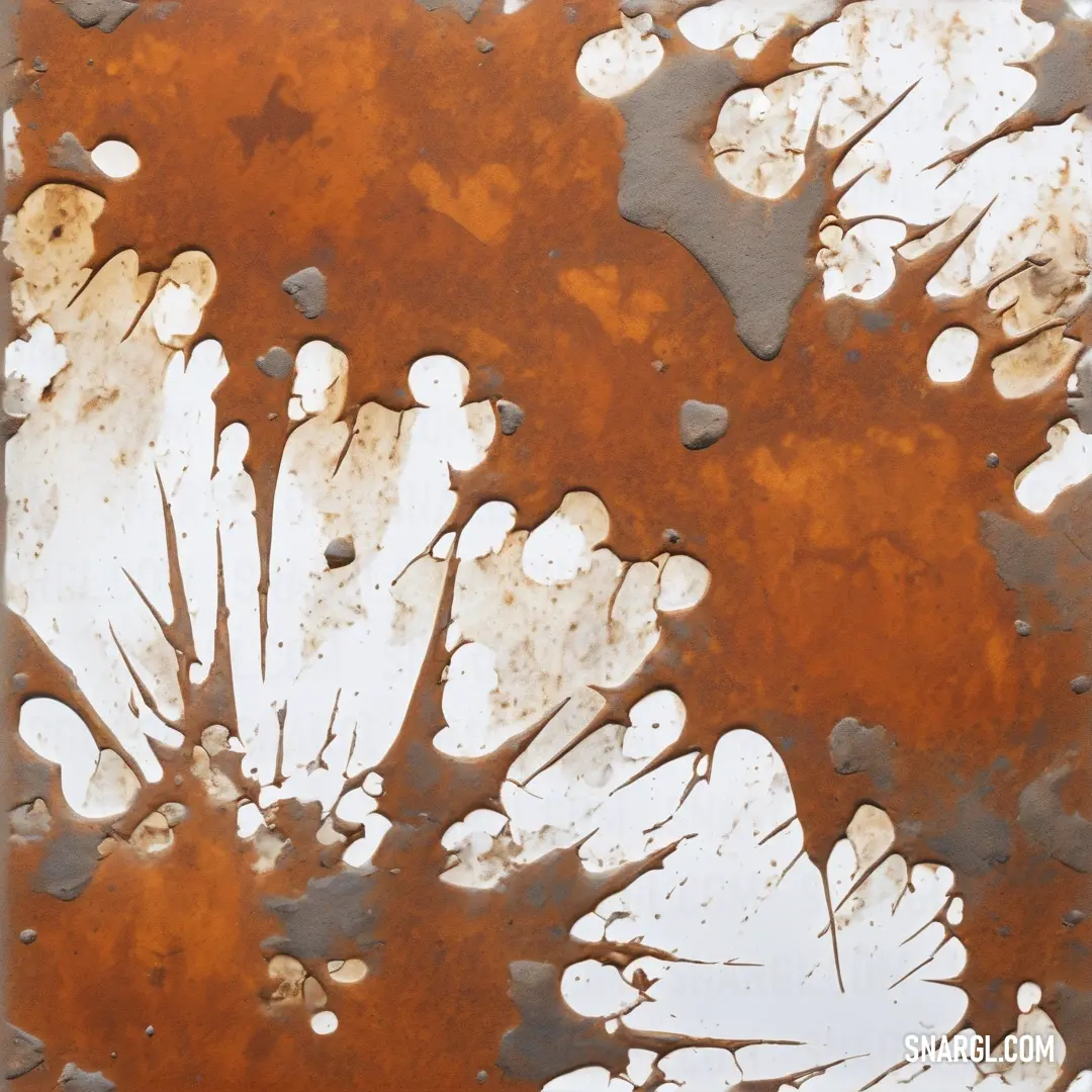 Rusted metal surface with white and brown paint on it and a flower design on the top of it. Color CMYK 50,42,44,6.