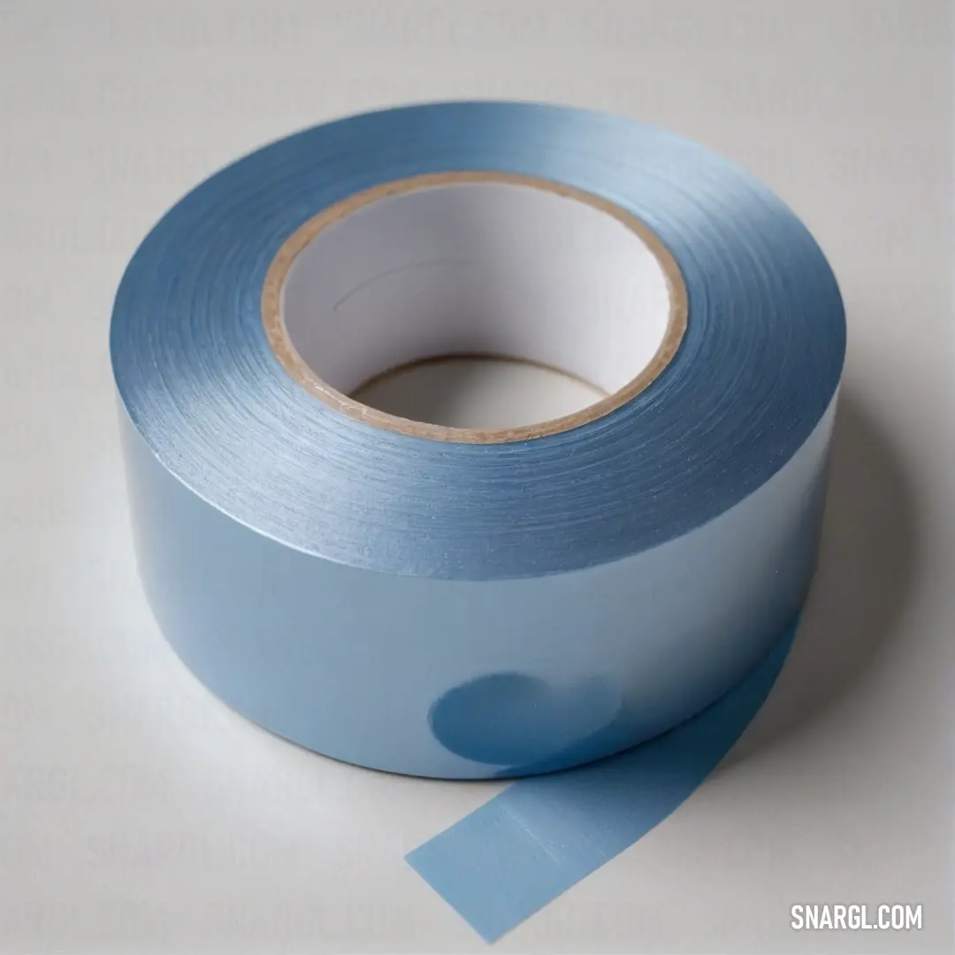 A roll of blue tape, crisp and vibrant, resting on a white background. The bright colors and clean lines highlight the simplicity and utility of the object, with CMYK color values of 87,77,0,0.