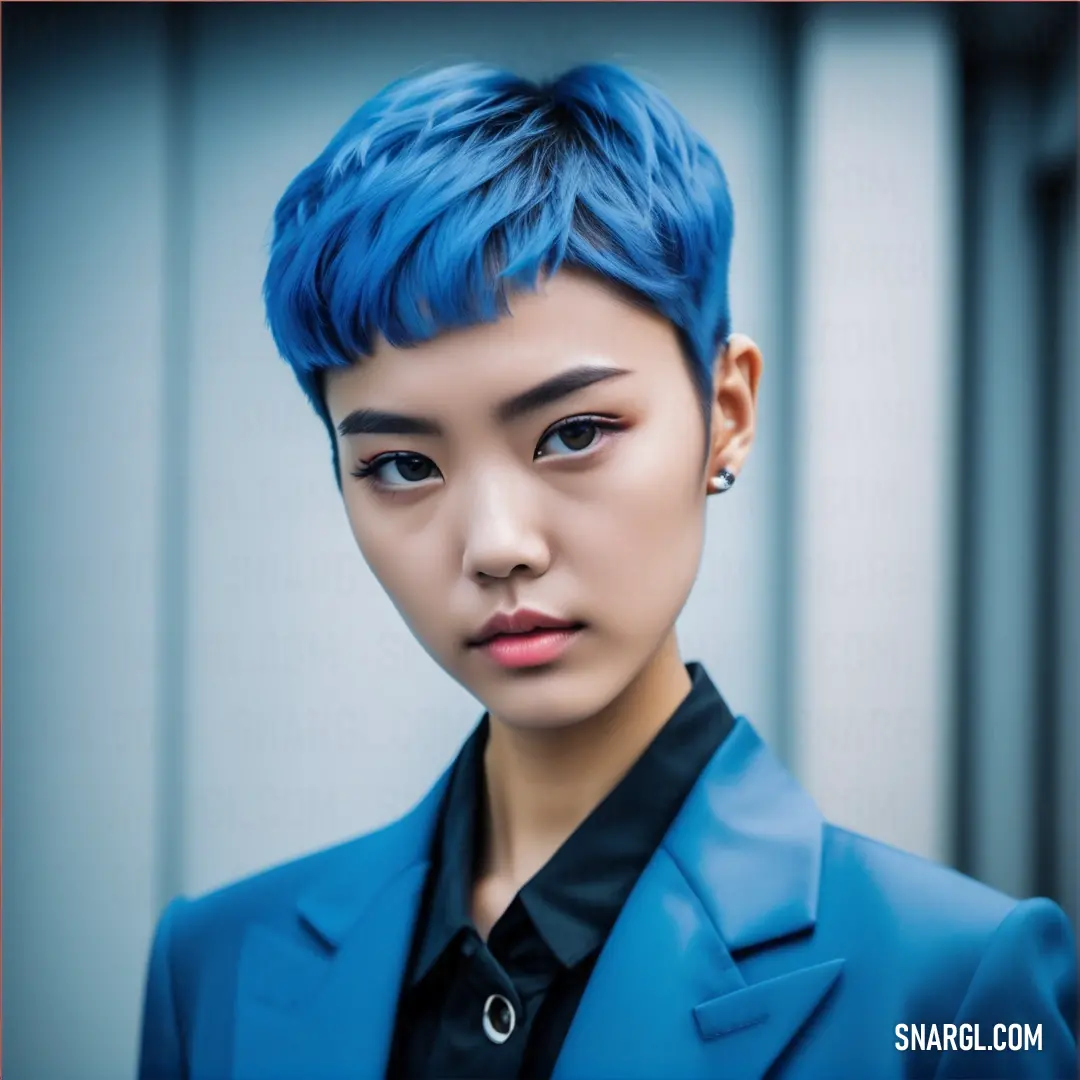 Woman with blue hair and a blue suit jacket on and a black shirt on and a black shirt on. Color CMYK 78,30,0,0.