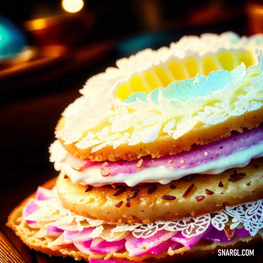 Stack of cookies with frosting and sprinkles on top of each other on a table. Color PANTONE 240.