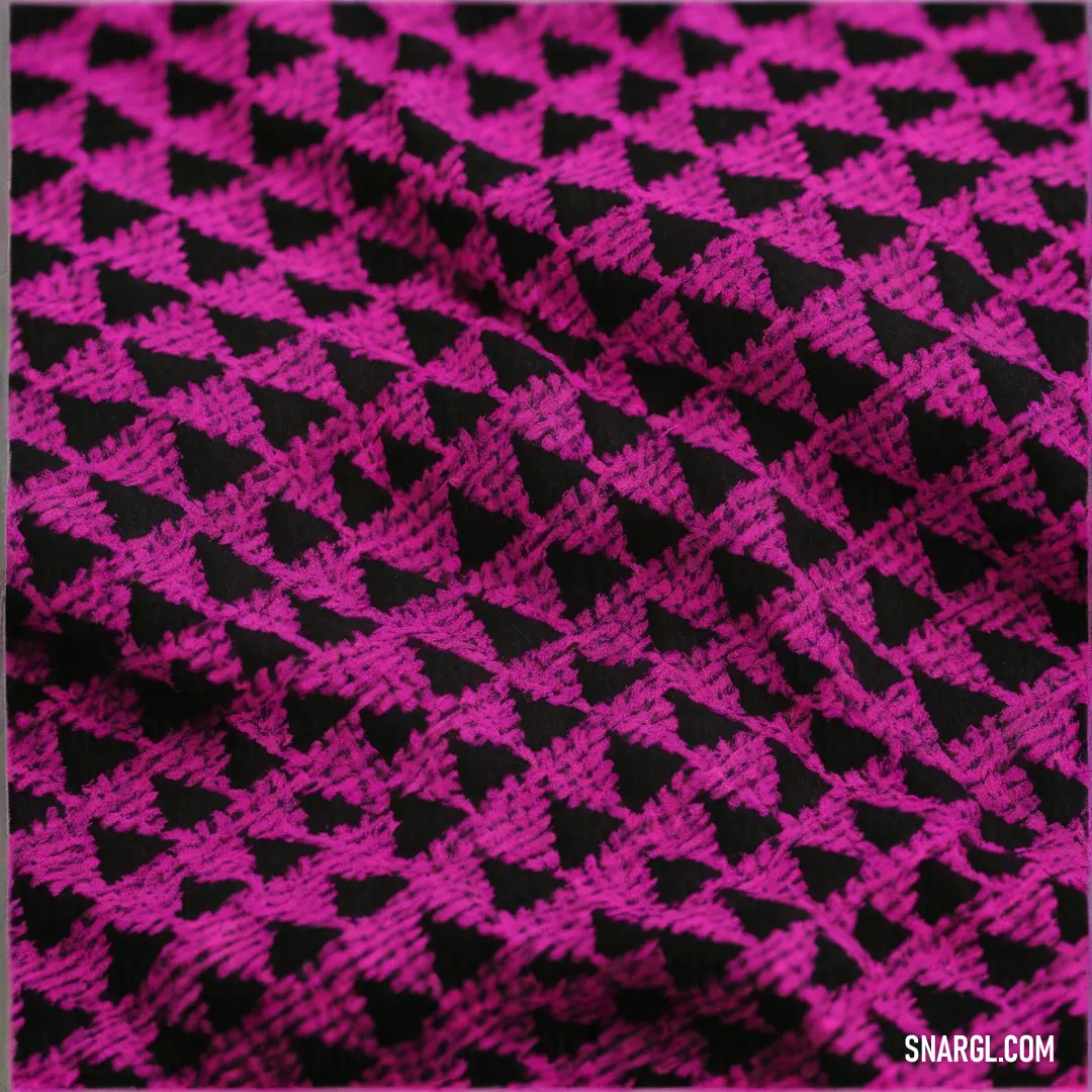 Pink and black knitted fabric with a pattern of leaves on it,. Example of #A92581 color.