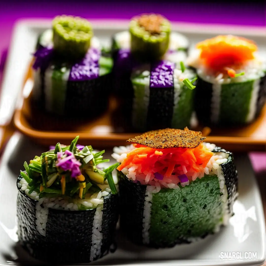Plate of sushi with different toppings on it on a table with a purple background and a purple wall. Color #425A3C.