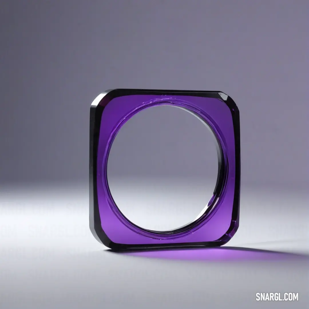 A captivating purple ring rests atop a sleek white table, casting subtle shadows against a muted gray wall and pristine white floor, harmonizing modern design with vibrant color, inviting curiosity and admiration.