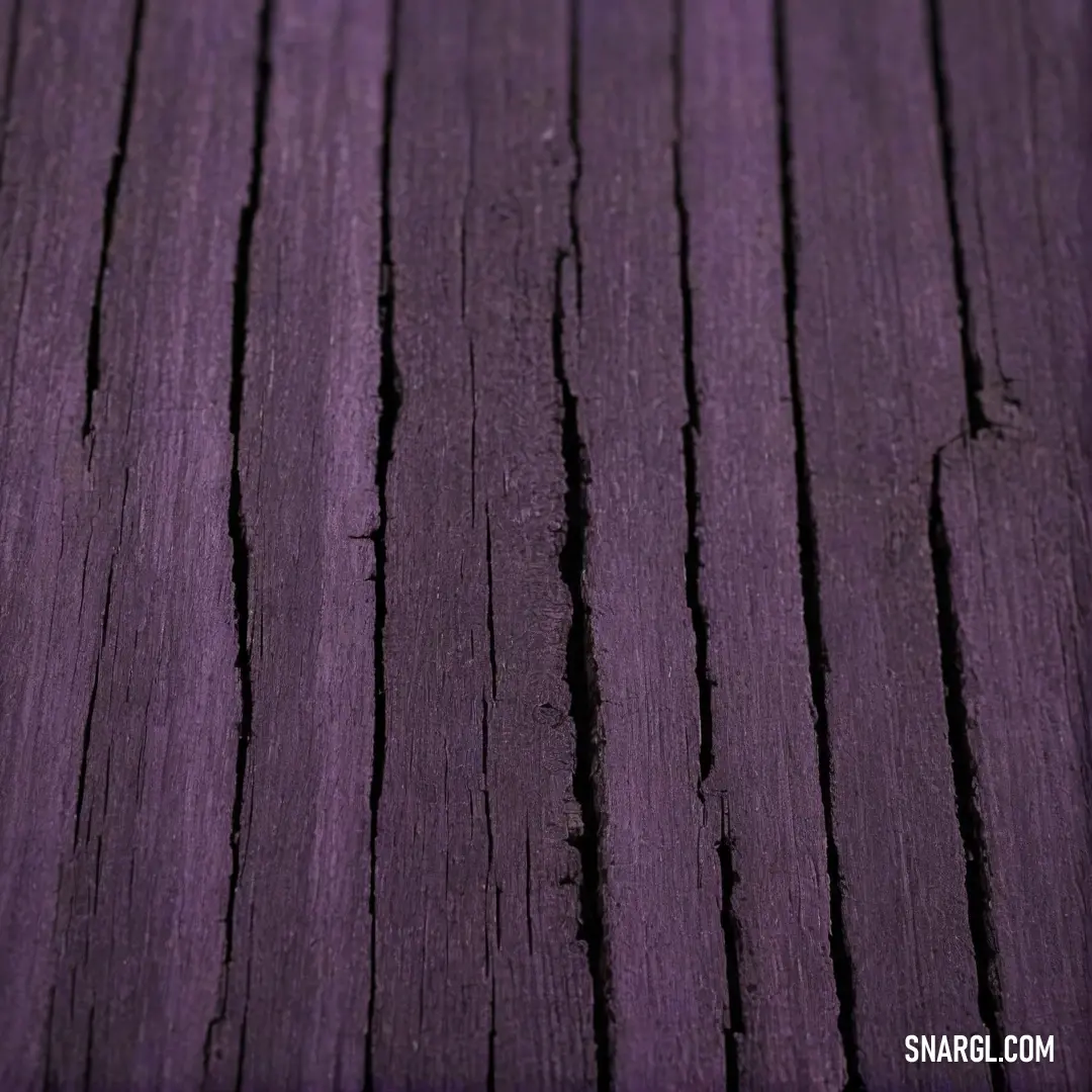 A close-up of a striking purple wooden surface adorned with a modern cell phone, artistically blending technology and nature in a deliberate composition.