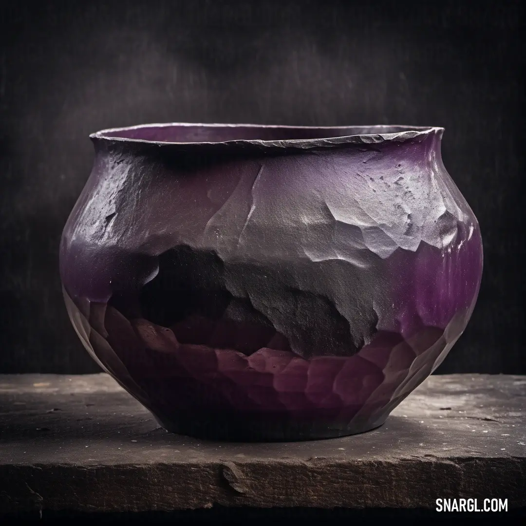 A striking purple vase elegantly perched on a rustic wooden table, juxtaposed against a sleek black wall, creating a stunning visual contrast that exudes modern charm while beautifully representing the PANTONE 260 color.