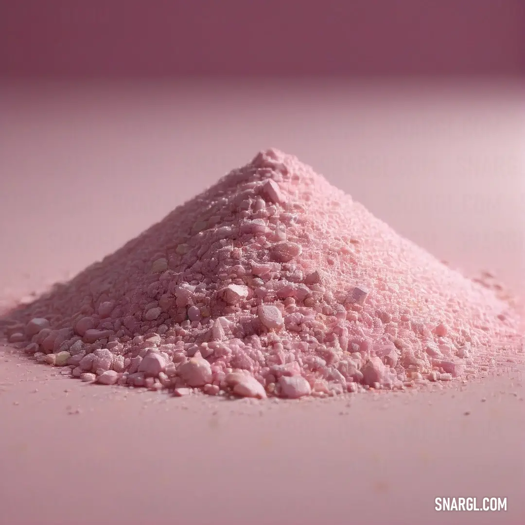 A vibrant heap of soft pink powder resting on a playful pink backdrop. This image beautifully showcases the delicate texture of the powder while emphasizing the harmonious tone of pink, creating a dreamy and inviting atmosphere.