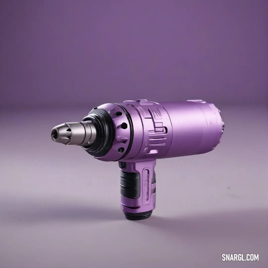 A powerful purple electric drill placed on a matching purple surface, featuring a sturdy black handle and precision tip, combining vibrant hues with robust functionality - ideal for both home improvement and craftsmanship projects.