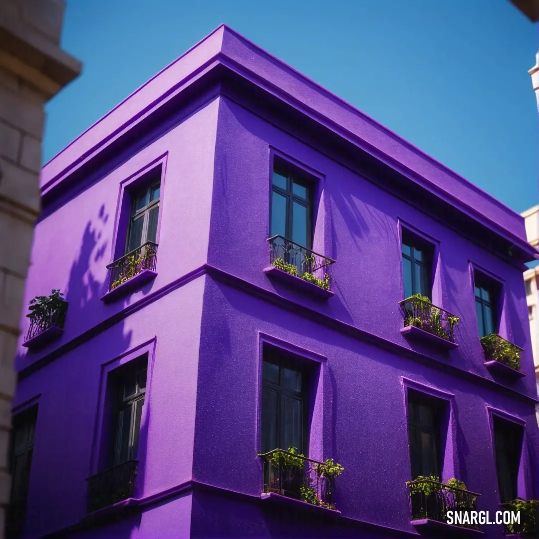 Purple building with a balcony and balconies on the windows and balconies on the balconies. Color #5B2E7E.