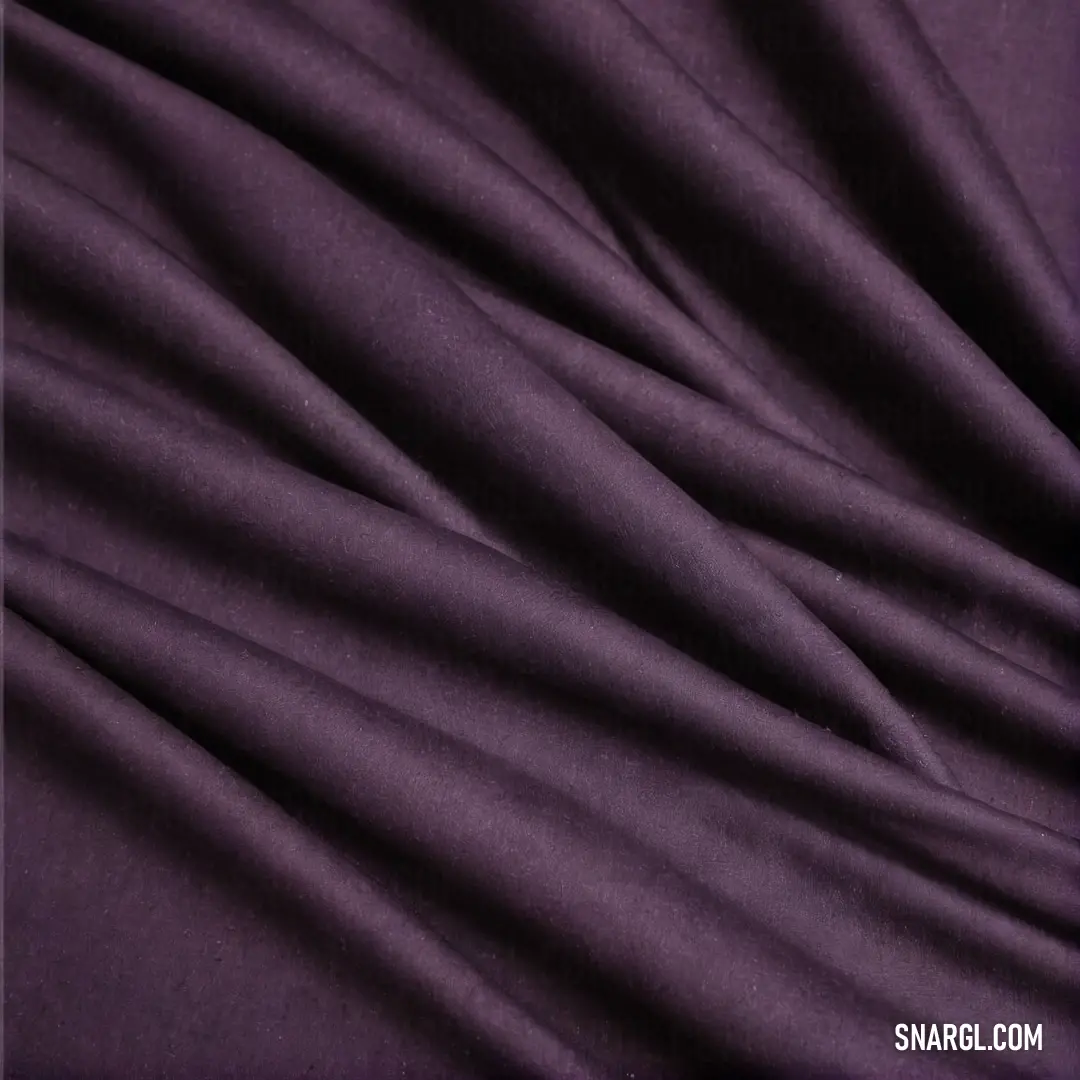 A serene piece of purple fabric featuring a delicate, thin line gracefully running alongside it, subtly illuminated to reveal richness and depth in the RGB 99,40,98 color profile.